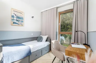 Łóżko lub łóżka w pokoju w obiekcie Kombucha Premium Apartment Wynalazek