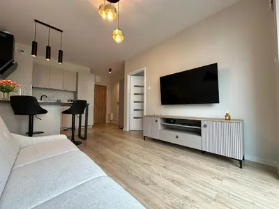 Telewizja i/lub zestaw kina domowego w obiekcie Apartament Nova Ochota, Tennis court, Train & Bus nearby
