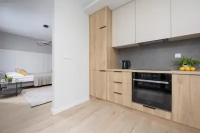 Kuchnia lub aneks kuchenny w obiekcie Piękne Studia dla 3 osób & Parking Warszawa by Noclegi Renters