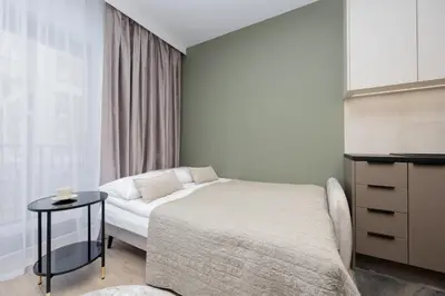 Łóżko lub łóżka w pokoju w obiekcie Piękne Studia dla 3 osób & Parking Warszawa by Noclegi Renters