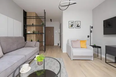 Część wypoczynkowa w obiekcie Piękne Studia dla 3 osób & Parking Warszawa by Noclegi Renters