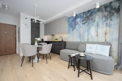 Część wypoczynkowa w obiekcie Wyjątkowe Studia w Warszawie by Noclegi Renters
