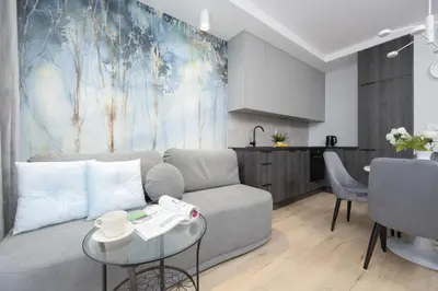 Część wypoczynkowa w obiekcie Wyjątkowe Studia w Warszawie by Noclegi Renters