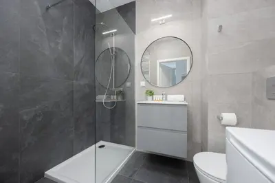 Łazienka w obiekcie Wyjątkowe Studia w Warszawie by Noclegi Renters