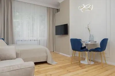 Telewizja i/lub zestaw kina domowego w obiekcie Elegant Apartments Grójecka in Warsaw by Noclegi Renters