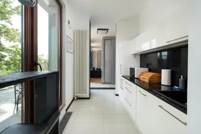 Kuchnia lub aneks kuchenny w obiekcie Ochota Deluxe Apartment by BookingHost