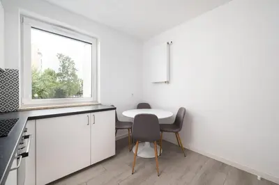 Kuchnia lub aneks kuchenny w obiekcie Dunikowskiego Comfy Apartments by BookingHost