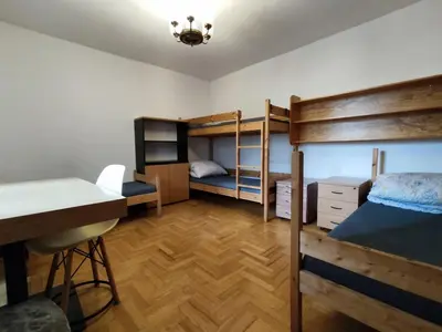 Łóżko lub łóżka w pokoju w obiekcie Lubava