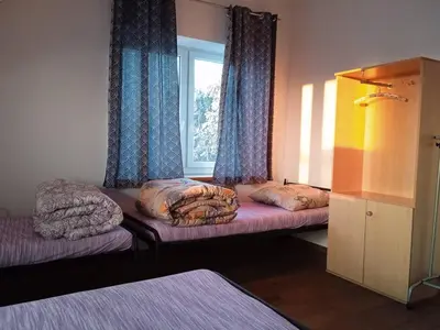 Łóżko lub łóżka w pokoju w obiekcie Lubava