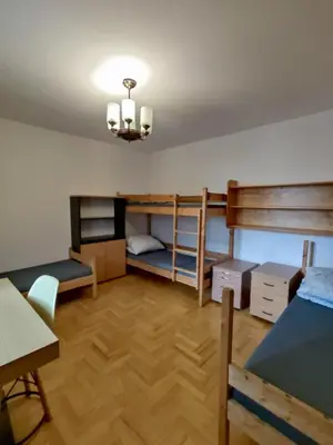 Łóżko lub łóżka w pokoju w obiekcie Lubava