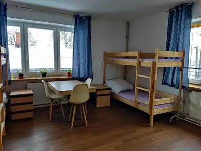 Łóżko lub łóżka w pokoju w obiekcie Lubava