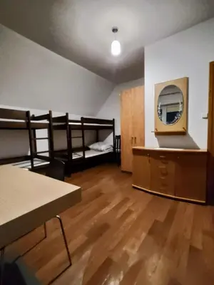Łóżko lub łóżka w pokoju w obiekcie Lubava