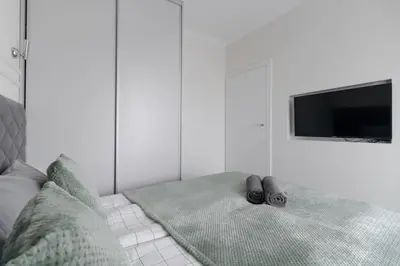Łóżko lub łóżka w pokoju w obiekcie Urban Chic - City Center - 3 Bedroom Apartment - 12 People - Siedmiogrodzka 3