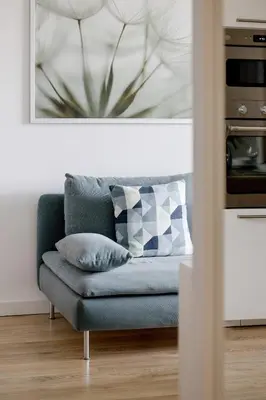 Część wypoczynkowa w obiekcie Comfy Two-Bedroom Apartment near Chopin Airport Warsaw's Ursynów by Noclegi Renters