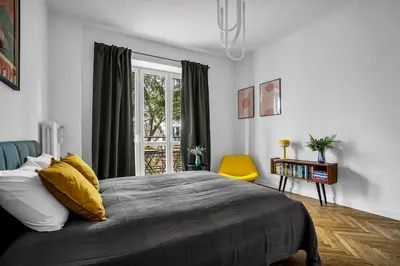 Łóżko lub łóżka w pokoju w obiekcie Warsaw Suite near River - 58m2, Metro, Balcony