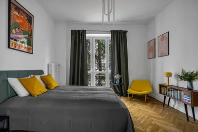 Łóżko lub łóżka w pokoju w obiekcie Warsaw Suite near River - 58m2, Metro, Balcony