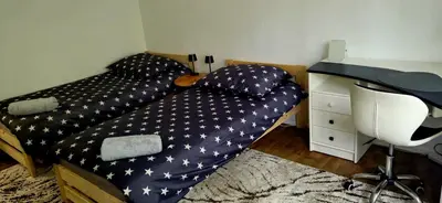 Łóżko lub łóżka w pokoju w obiekcie Warszawa Wola Pokoje blisko metra