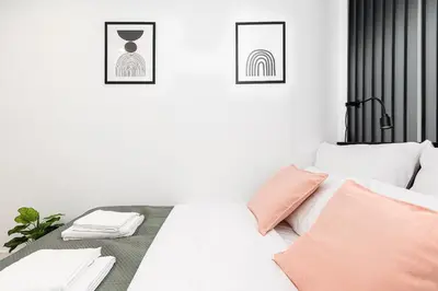 Łóżko lub łóżka w pokoju w obiekcie Waliców 20 P&O Apartments