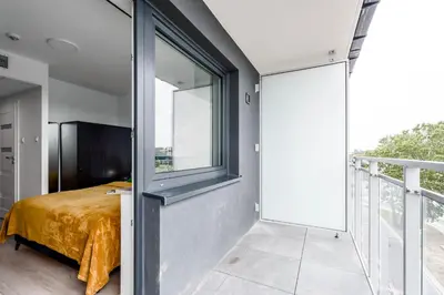 Łóżko lub łóżka w pokoju w obiekcie Chill Apartments Pileckiego
