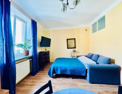 Łóżko lub łóżka w pokoju w obiekcie Five Colors Apartment Warsaw
