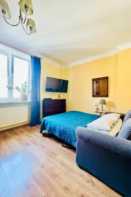 Łóżko lub łóżka w pokoju w obiekcie Five Colors Apartment Warsaw