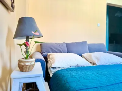 Łóżko lub łóżka w pokoju w obiekcie Five Colors Apartment Warsaw