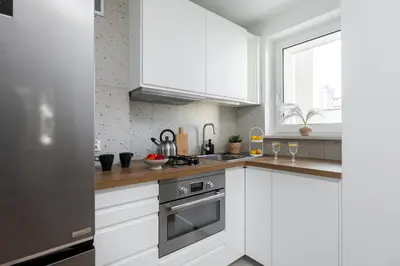 Kuchnia lub aneks kuchenny w obiekcie SuperApart Twarda 56a - Blisko Złotych Tarasów