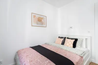 Łóżko lub łóżka w pokoju w obiekcie SuperApart Twarda 56a - Blisko Złotych Tarasów