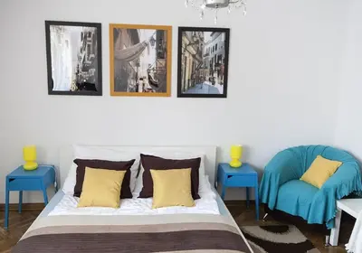 Łóżko lub łóżka w pokoju w obiekcie Warsaw Budget Apartments