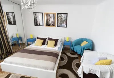 Łóżko lub łóżka w pokoju w obiekcie Warsaw Budget Apartments