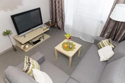 Telewizja i/lub zestaw kina domowego w obiekcie Warsaw Budget Apartments
