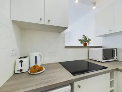 Kuchnia lub aneks kuchenny w obiekcie Warsaw City Centre - Apartment for 3 people by Noclegi Renters