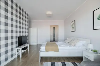 Telewizja i/lub zestaw kina domowego w obiekcie West Station Apartments by Arrenda