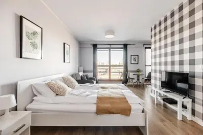Telewizja i/lub zestaw kina domowego w obiekcie West Station Apartments by Arrenda