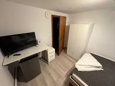 Telewizja i/lub zestaw kina domowego w obiekcie Hostel 22