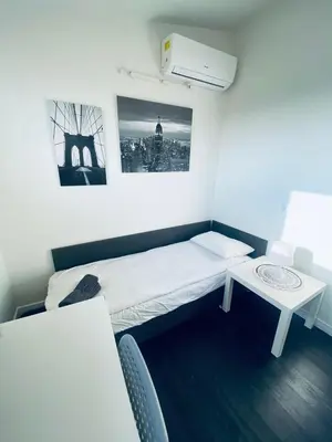Łóżko lub łóżka w pokoju w obiekcie Apartel24pl Chopin House Self Check-in