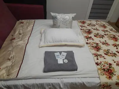 Łóżko lub łóżka w pokoju w obiekcie Warszawa Z miłością