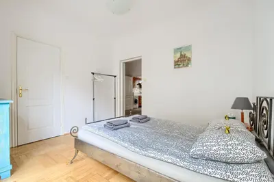 Łóżko lub łóżka w pokoju w obiekcie Orla Residence