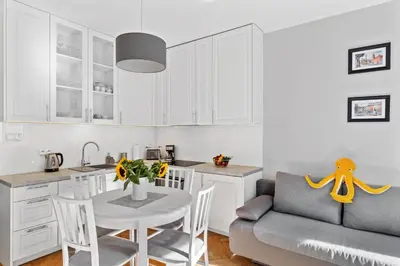 Kuchnia lub aneks kuchenny w obiekcie Cute apartment in the historic old town of Warsaw