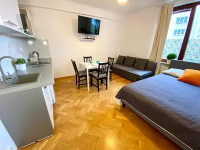 Kuchnia lub aneks kuchenny w obiekcie Center Warsaw - Apartmenty Jana Pawła II