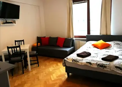 Łóżko lub łóżka w pokoju w obiekcie Center Warsaw - Apartmenty Jana Pawła II