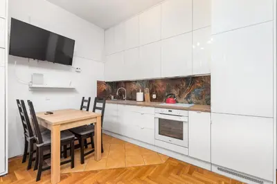 Kuchnia lub aneks kuchenny w obiekcie Wileńska 33 by Homeprime