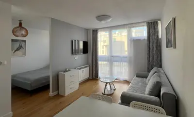 Telewizja i/lub zestaw kina domowego w obiekcie ApartamentW3M