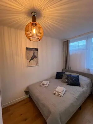 Łóżko lub łóżka w pokoju w obiekcie ApartamentW3M