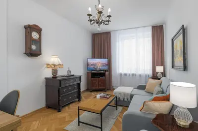 Telewizja i/lub zestaw kina domowego w obiekcie Luxury in Cozy Spacious Condo near Heart of Warsaw