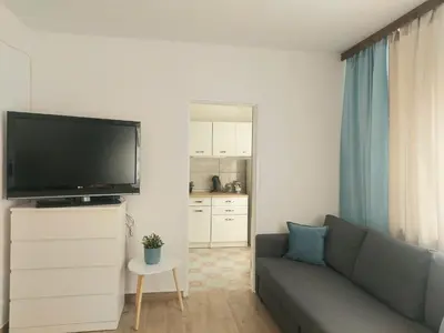 Telewizja i/lub zestaw kina domowego w obiekcie Rental Apartments Smoluchowskiego