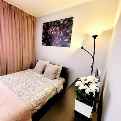 Łóżko lub łóżka w pokoju w obiekcie Apartament Centrum Warszawa