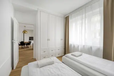 Łóżko lub łóżka w pokoju w obiekcie Labo Apartment Marszałkowska