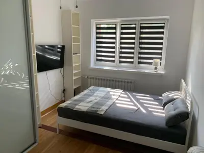 Łóżko lub łóżka w pokoju w obiekcie Apartament na zielonym Nowolipiu