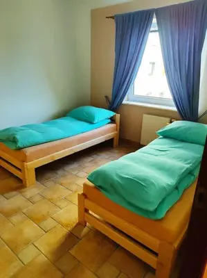 Łóżko lub łóżka w pokoju w obiekcie Apartament Metro Wilanowska